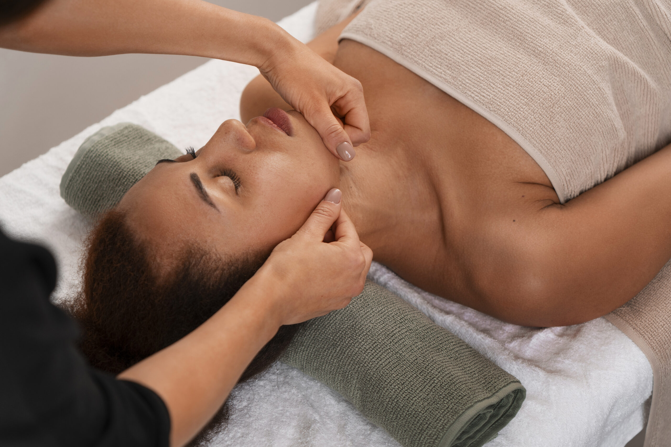 view-woman-getting-facial-yoga-massage-stay-young